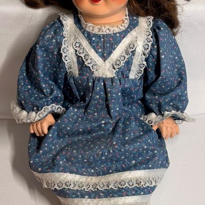 Sale Photo Thumbnail #389: Hair, extra clothes shown were original items when doll was bought. 
Eyes open when upright closed when laying down.