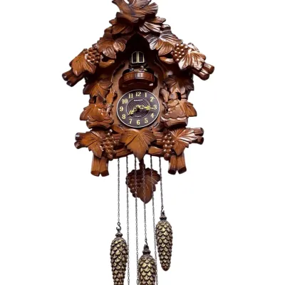 Sale Photo Thumbnail #30: Intricately carved Kaiser wooden cuckoo clock featuring bird, leaf, and pinecone motifs with dangling weights.