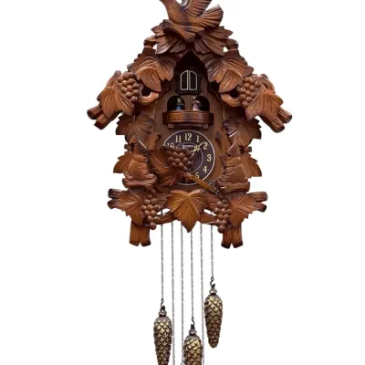 Sale Photo Thumbnail #66: Hand-carved Black Forest style cuckoo clock featuring a bird topper, grape leaves, and pinecone weights.
