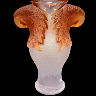 Sale Photo Thumbnail #2: Lalique-style frosted and amber glass vase, featuring twin sculpted parrot head handles on a textured clear body.