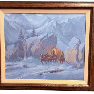 Sale Photo Thumbnail #57: Framed oil painting on canvas depicting a covered wagon and horse team traveling through a snowy mountain landscape, signed lower right.