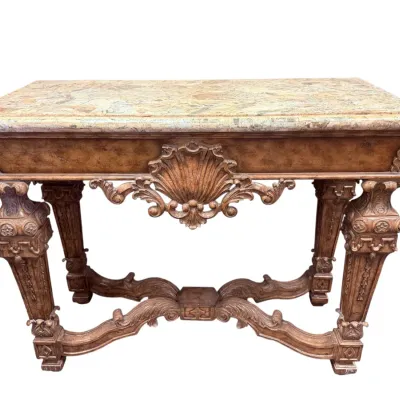 Sale Photo Thumbnail #8: Ornate Italian Baroque style carved wood console table featuring a center shell motif, heavy scrolled legs, and a speckled marble top.