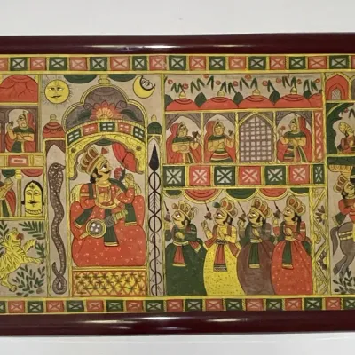 Sale Photo Thumbnail #50: Framed Indian Pattachitra folk art painting depicting various mythological and royal scenes, displayed in a glossy wood frame with brass corner brackets.