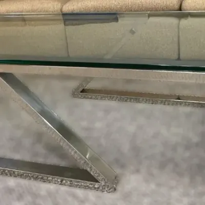Sale Photo Thumbnail #3: Modernist chrome Z-base coffee table featuring a clear glass top.