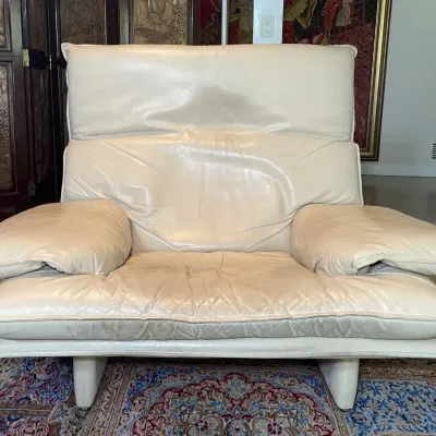 Sale Photo Thumbnail #80: Vico Magistretti for Cassina Maralunga chair, featuring overstuffed cream leather upholstery and a signature folding high/low backrest.