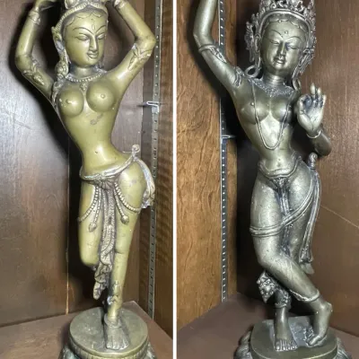 Sale Photo Thumbnail #57: Pair of vintage bronze Apsara dancer statues, featuring ornate headdresses, detailed jewelry, and lotus pedestal bases.