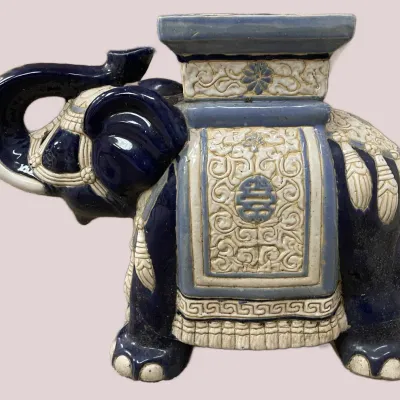 Sale Photo Thumbnail #64: Vintage ceramic Asian elephant garden stool, finished in cobalt blue and off-white glaze with raised scrollwork detail.