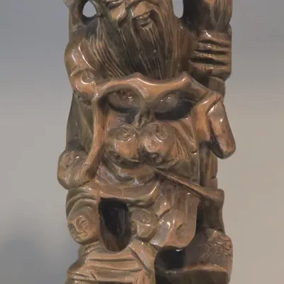Sale Photo Thumbnail #10: Hand-carved wooden Chinese Shou Lao wise man statue featuring detailed figures, staff, and a polished finish.