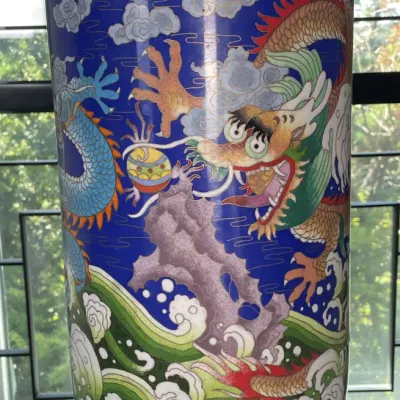 Sale Photo Thumbnail #32: Large Chinese cloisonné enamel umbrella stand or floor vase, featuring a detailed dragon motif against a cobalt blue ground with wave and cloud patterns.