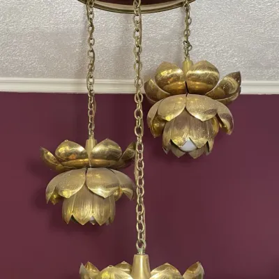 Sale Photo Thumbnail #23: Vintage Hollywood Regency style brass lotus blossom 3-pendant swag chandelier mounted to a ceiling canopy plate.
