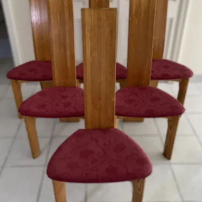Sale Photo Thumbnail #78: Set of six post-modern oak dining chairs featuring tall plank backrests and triangular seats upholstered in burgundy floral jacquard fabric.