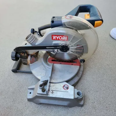 Ryobi 7-1/4" Compound Miter Saw, Model No TS1142L, Electric, 