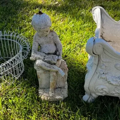 Garden Planters With Child Statue Reading A Book