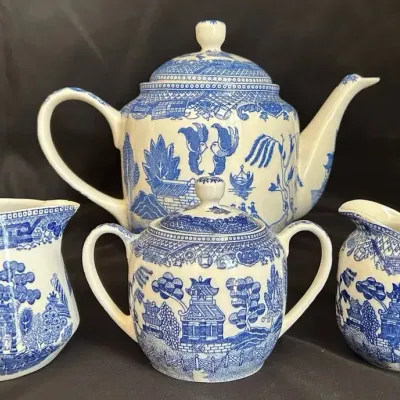 Blue Willow Teapot And Other Dishes