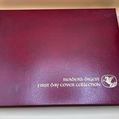 Vintage Reader's Digest First Day Cover Collection album bound in maroon faux-leather with gold foil lettering.