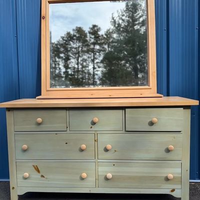 Rustic pine dresser and matching detachable square mirror with a light green painted finish and wooden knobs.