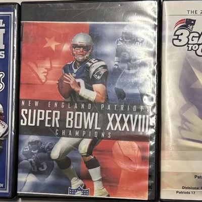 Set of three New England Patriots commemorative DVDs, including Super Bowl XXXVI Champions, Super Bowl XXXVIII Champions, and 3 Games to...
