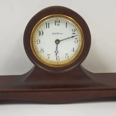 Sale Photo Thumbnail #136: 1136	UNUSUAL SETH THOMAS CLOCK IN SOLID MAHOGANY BASE W/SCROLLED FEET																																																																																																																																																																																										