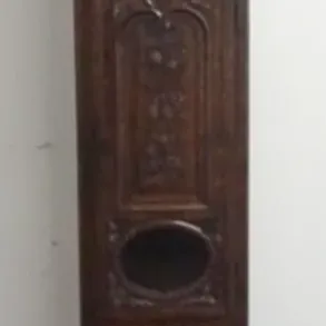 Sale Photo Thumbnail #198: 1197	CONTINENTAL OAK TALL CASE CLOCK W/BRASS & ENAMEL FACE & FLORAL & FRUIT CARVING, APPROXIMATELY 16 IN X 12 IN X 94 IN HIGH																																																																																																																																		