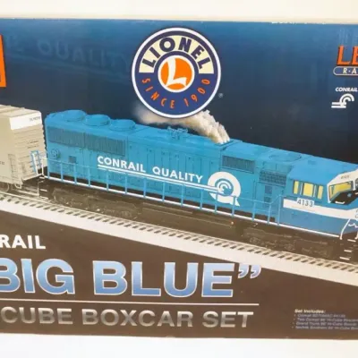 Sale Photo Thumbnail #163: 1163	LIONEL TRAINS LIONEL LEGACY RAIL SOUNDS CONRAIL *BIG BLUE* HIGH CUBE CONRAIL SD70MAC NO 4153 LOCOMOTIVE, SEALED IN BAG																																																																																																																																				