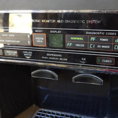 Vintage General Electric Electronic Monitor and Diagnostic System door dispenser unit for chilled water and ice.
