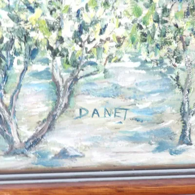 Impressionist landscape oil painting featuring an olive grove, signed Danet in the lower center, presented in a framed border.