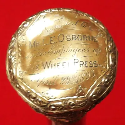 Inscription reading "Presented to Mr. L. E. Osborne by the Employees of The Wheel Press, April 29th 1893."