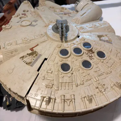 Vintage Kenner Star Wars Millennium Falcon vehicle play set, circa late 1970s to early 1980s, showing some age-related discoloration and...