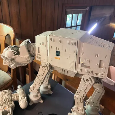 Sale Photo Thumbnail #109: Vintage Kenner Star Wars Imperial AT-AT Walker vehicle play set, circa 1980, displayed with other vintage Star Wars toys and figures.