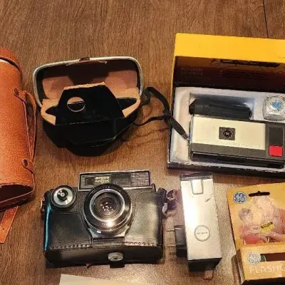 Vintage Cameras And Binoculars 