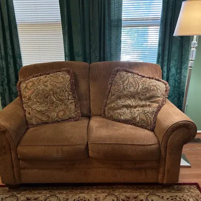 Brown Love Seat And Standing Lamp
