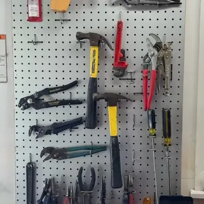 Hammers, Pliers, Small Brown Vise, Tape Measures, And More