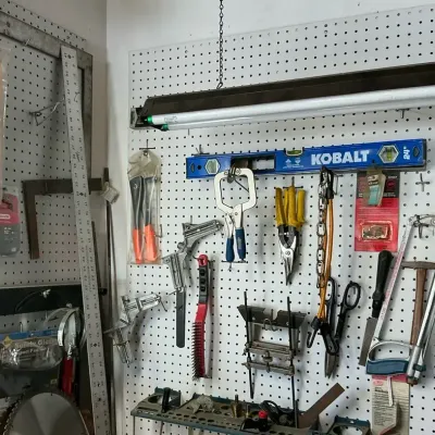 Wall Full Of Tools Levels, Blades, And Hand Tools 