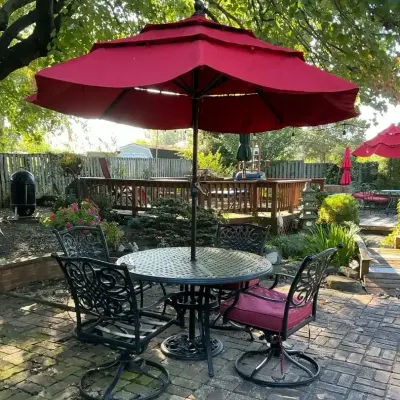 4’ Round Cast Aluminum Table With 4 Chairs And Umbrella 