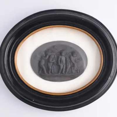 Wedgwood, Antique Black Basalt Framed Cherub Plaque