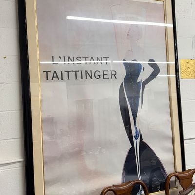 Sale Photo Thumbnail #27: Large vintage 'L'Instant Taittinger' champagne advertising poster by Grace Prentiss, housed in a black and gold-toned frame.