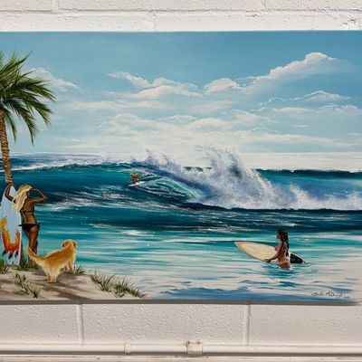 Contemporary canvas painting depicting a tropical beach scene with surfers, a palm tree, and a golden retriever, signed by the artist in...