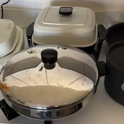 Lot Of Electric Skillets And Pans 