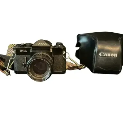 Vintage Canon F-1 35mm SLR Film Camera w/ FD 50mm Lens & Shell Case