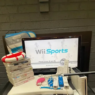 Wii Game System W/ Controllers, Games, Balance Board, And Dance Mat