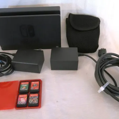 Sale Photo Thumbnail #134: Nintendo Switch Games And Charger