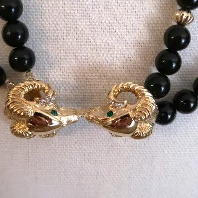 Black Glass Beads With Rams Head Clasp
