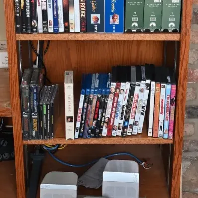 Sale Photo Thumbnail #108: Oak Bookcase w/ Sony Blu-Ray Player, DVDs & CDs