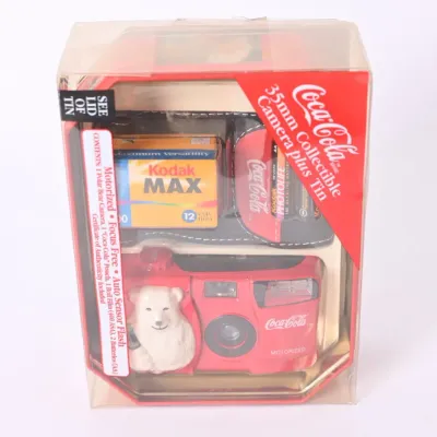 Sale Photo Thumbnail #40: NIB Coca-Cola 35mm Collectible Camera Gift Tin