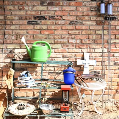 Sale Photo Thumbnail #286: Plant Shelf, Wind Chimes, Watering Can & Yard Decor