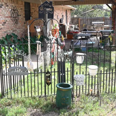Sale Photo Thumbnail #287: Wind Chimes, Shepherd Hooks & Plant Stands