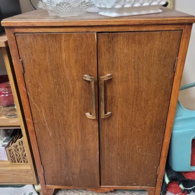 Sale Photo Thumbnail #23: Vintage mid-century wooden record cabinet.