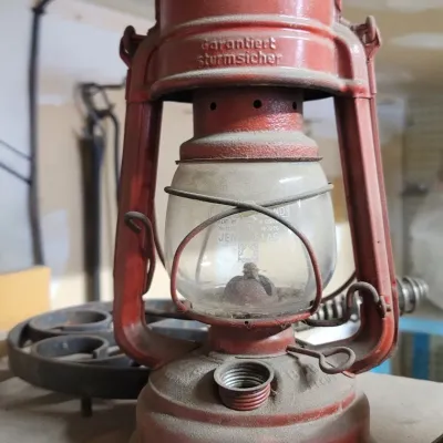 Sale Photo Thumbnail #3: Vintage red Feuerhand Sturmkappe kerosene lantern with original Jenaer Glas globe.