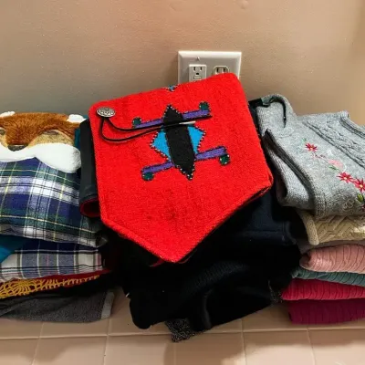 Women’s Apparel - Mostly Sweaters & Vests 