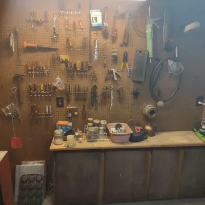 Pegboard Contents And Small Shelf